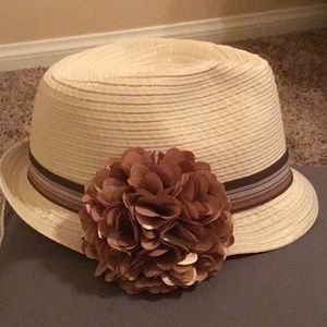 Beige fedora hat brown flower